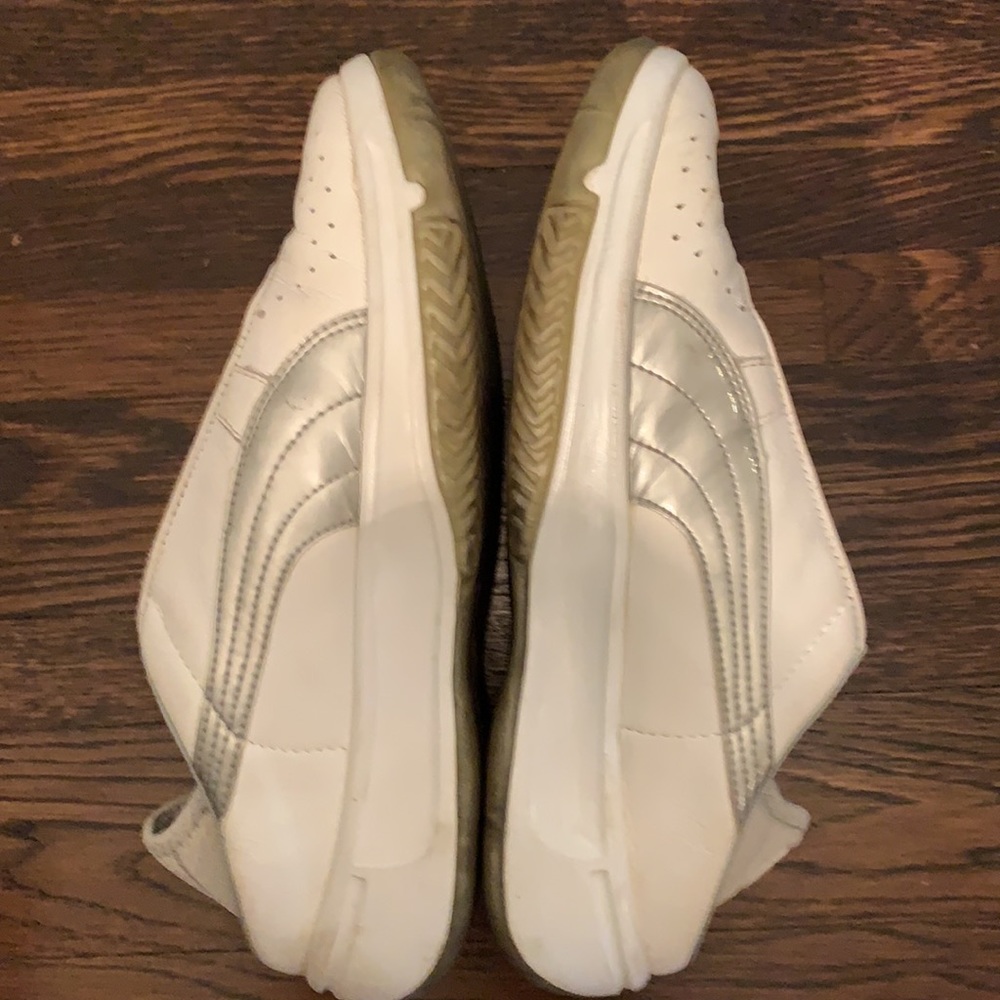 Women’s leather Puma slip-ons.